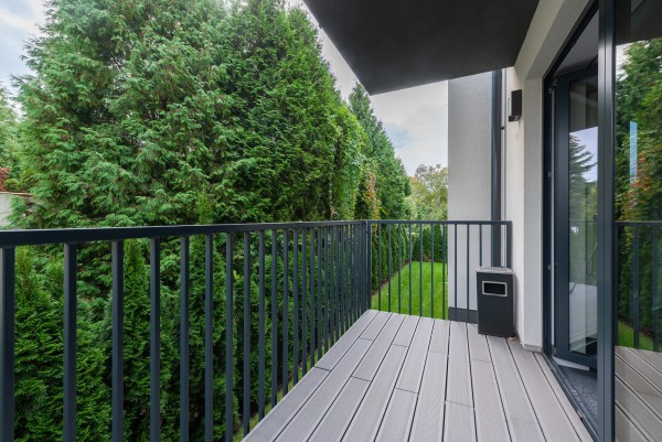 empty balcony and green hedge