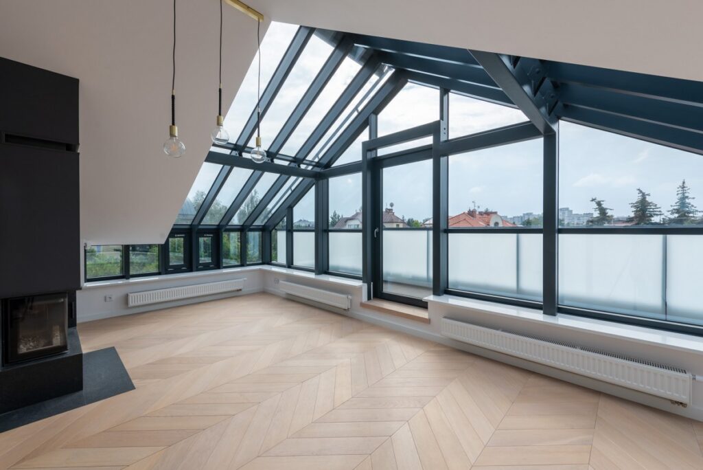room with large metal skylight